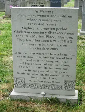 The gravestone in St Mary's churchyard commemorating the reburial of the bones discovered in Masham's lost cemetery