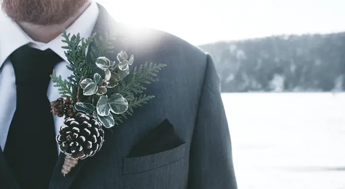 8 Essential Accessories For Winter Wedding Guests groom
