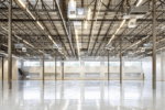 A spacious modern warehouse interior with high ceilings