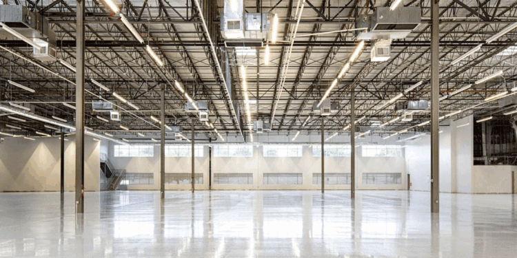 A spacious modern warehouse interior with high ceilings