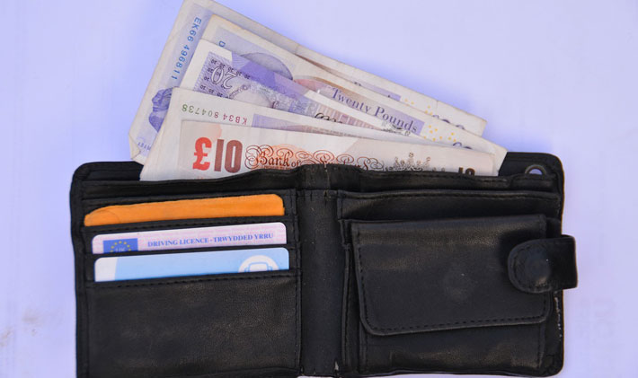 Nearly Half of Over 55s are using equity release to pay of Debts wallet