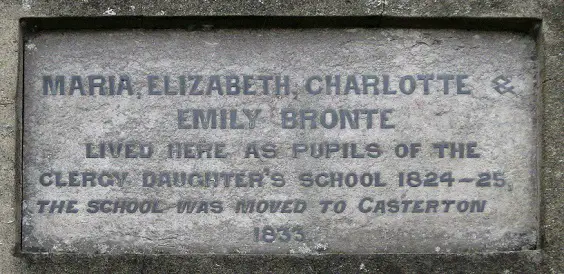 Dedication plaque on the side of the former school - the model for Charlotte Brontë’s foreboding 'Lowood Institution' in Jane Eyre.