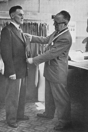 burton tailor measuring customer