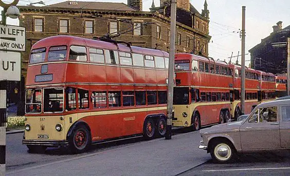 huddersfield trolleys and buses history P44 A line of trolleys and a motorbus on special service at St George’s Square. This was usually the holding area for football or ICI specials